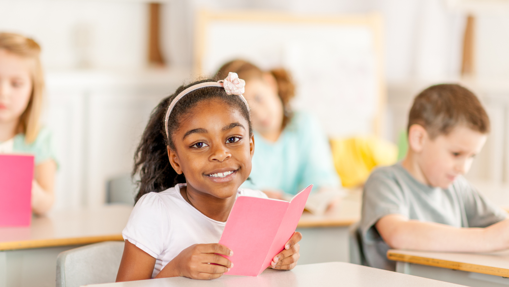 Little girl with book